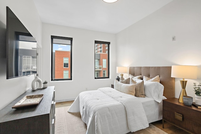 1002 Division St Unit 403, Nashville, TN 37203 - bedroom featuring light wood-style flooring