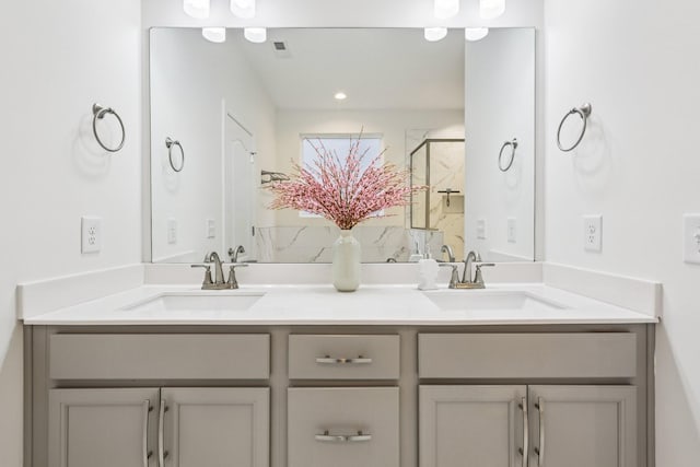 6807 Kew Gdn, Smyrna, TN 37167 - bathroom featuring double vanity and a marble finish shower