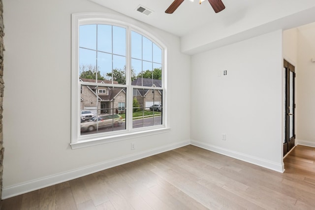 6807 Kew Gdn, Smyrna, TN 37167 - unfurnished room featuring healthy amount of natural light, a ceiling fan, and light wood finished floors
