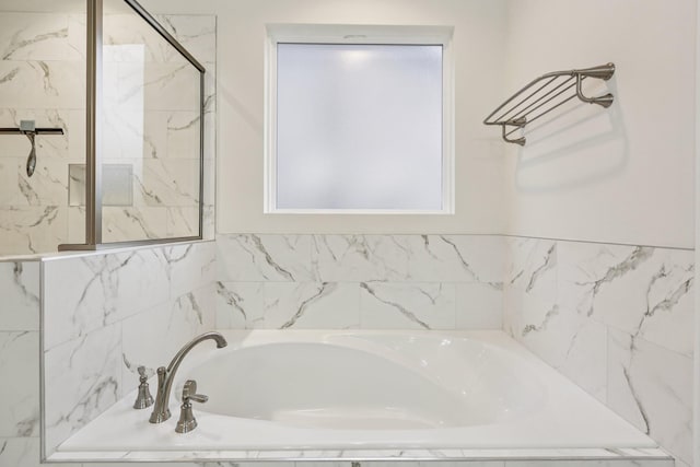 6807 Kew Gdn, Smyrna, TN 37167 - bathroom with a garden tub and a shower