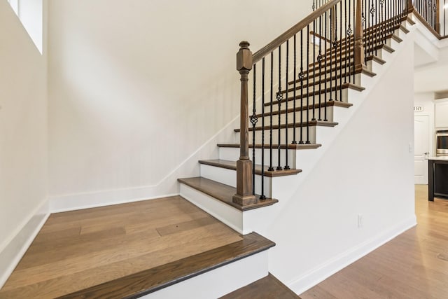 6807 Kew Gdn, Smyrna, TN 37167 - stairway featuring wood finished floors and baseboards