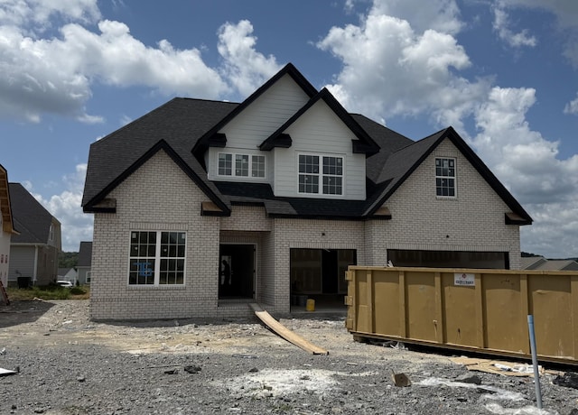 5856 Napa Valley Dr, Smyrna, TN 37167 - rear view of house featuring brick siding and a shingled roof