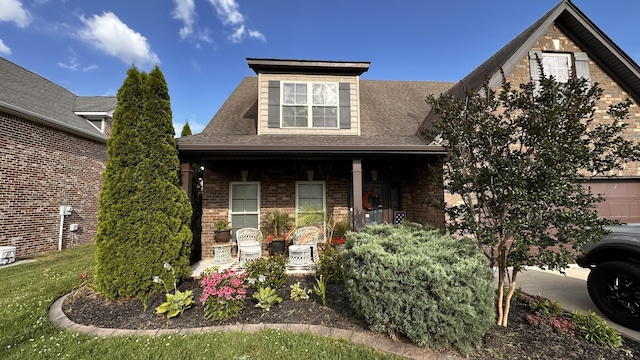 1248 Hensfield Dr, Murfreesboro, TN 37128 - view of front of property with covered porch, brick siding, and roof with shingles