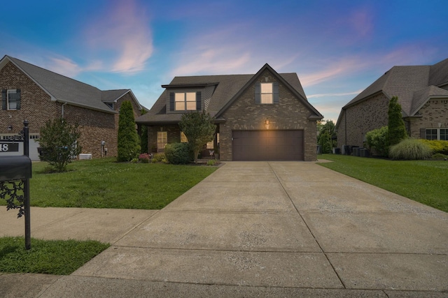 1248 Hensfield Dr, Murfreesboro, TN 37128 - traditional home with driveway, a front lawn, and brick siding