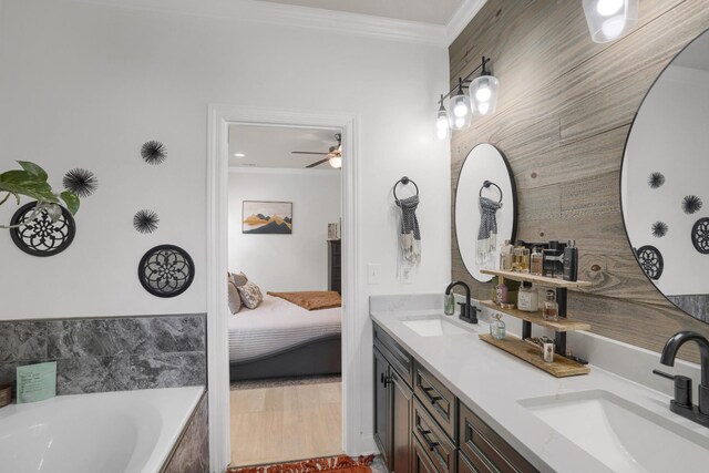 1248 Hensfield Dr, Murfreesboro, TN 37128 - bathroom with ornamental molding, double vanity, a bath, connected bathroom, and a ceiling fan