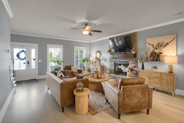 1248 Hensfield Dr, Murfreesboro, TN 37128 - living area featuring light wood-type flooring, ceiling fan, a fireplace, and crown molding