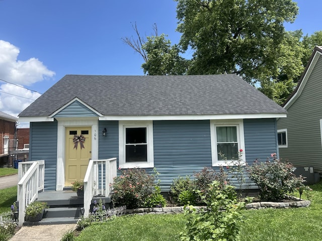 106 S Locust St S, Mount Pleasant, TN 38474 - view of front of house with a shingled roof and a front lawn