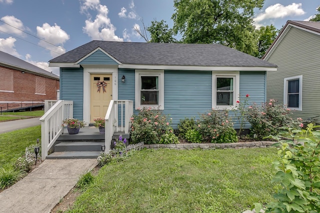 106 S Locust St S, Mount Pleasant, TN 38474 - view of front of property featuring a front yard and roof with shingles