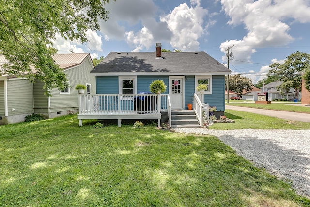 106 S Locust St S, Mount Pleasant, TN 38474 - bungalow featuring a chimney, a front lawn, and a shingled roof