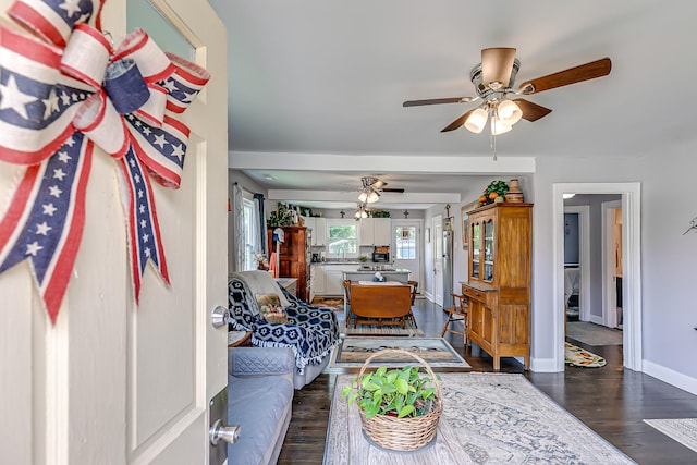 106 S Locust St S, Mount Pleasant, TN 38474 - living room featuring ceiling fan and dark wood-style floors