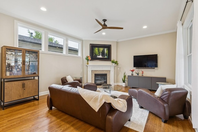 1322 Jewell Ave, Franklin, TN 37064 - living area with a ceiling fan, a glass covered fireplace, ornamental molding, wood finished floors, and recessed lighting