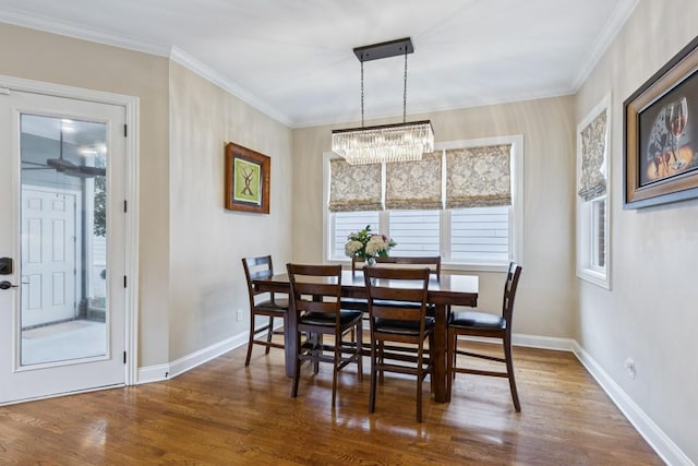 1322 Jewell Ave, Franklin, TN 37064 - dining space featuring wood finished floors, a chandelier, and crown molding