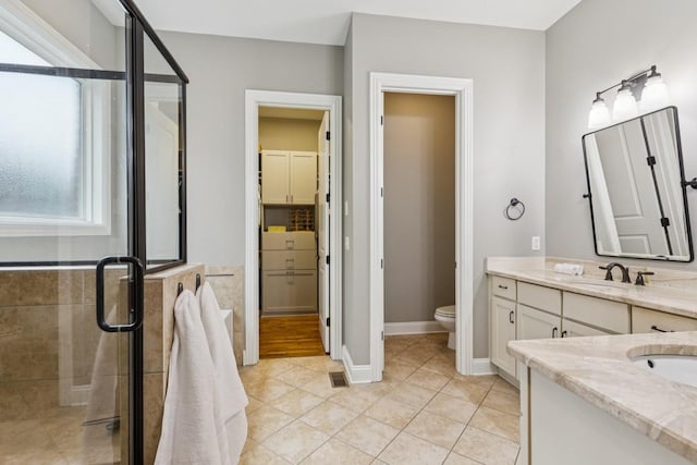 1322 Jewell Ave, Franklin, TN 37064 - bathroom featuring a stall shower, vanity, plenty of natural light, and tile patterned floors