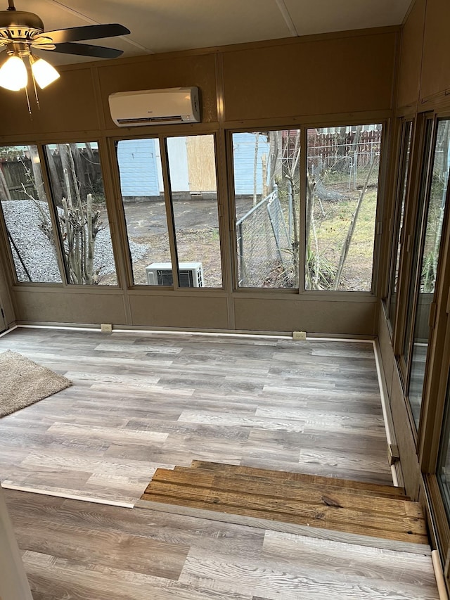 918 Velma Ln, Murfreesboro, TN 37129 - unfurnished sunroom with a wall mounted AC and wood finished floors