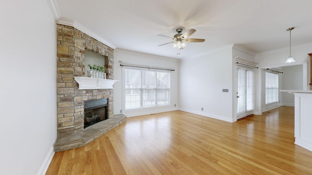 3325 Geneva Dr, Murfreesboro, TN 37128 - unfurnished living room with a fireplace, light wood-type flooring, a ceiling fan, and crown molding