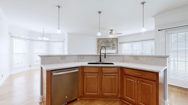 3325 Geneva Dr, Murfreesboro, TN 37128 - kitchen featuring stainless steel dishwasher, ceiling fan, ornamental molding, light countertops, and light wood-style floors