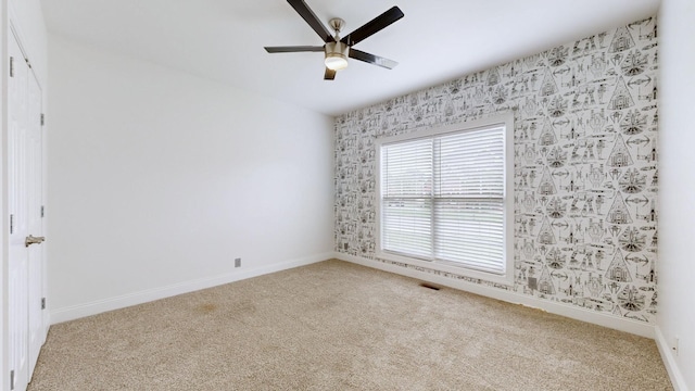 3325 Geneva Dr, Murfreesboro, TN 37128 - spare room featuring light colored carpet and a ceiling fan