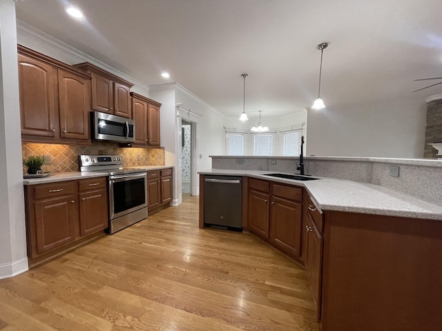 3325 Geneva Dr, Murfreesboro, TN 37128 - kitchen featuring appliances with stainless steel finishes, ornamental molding, light wood-type flooring, light countertops, and decorative backsplash