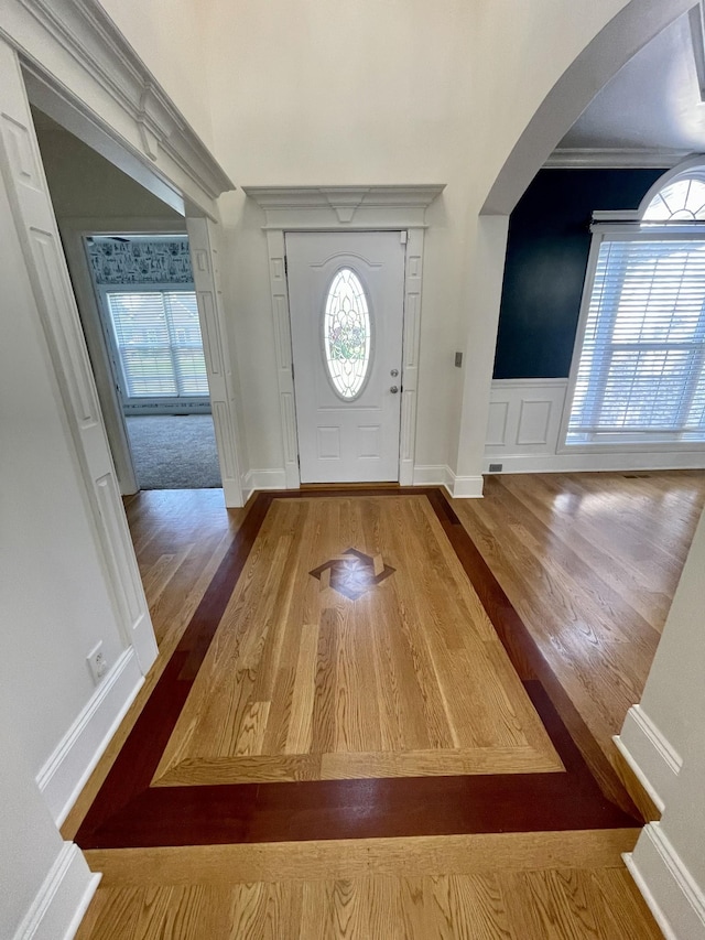 3325 Geneva Dr, Murfreesboro, TN 37128 - entryway featuring arched walkways, wood finished floors, and ornamental molding