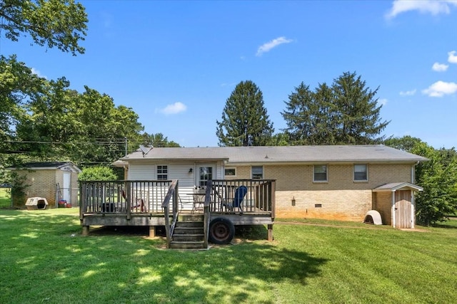 1109 N Charlotte St, Dickson, TN 37055 - back of property featuring a storage unit, crawl space, a yard, and brick siding