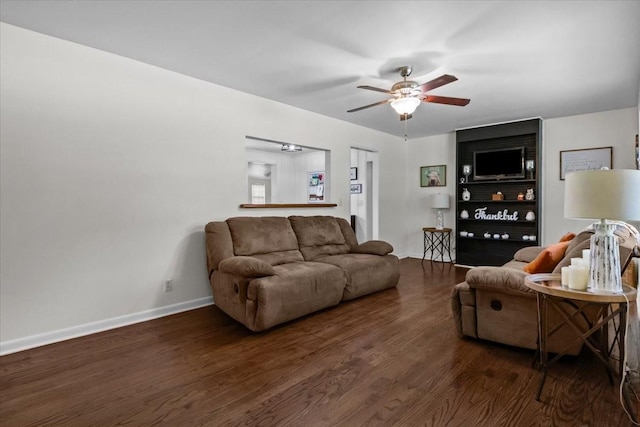 1109 N Charlotte St, Dickson, TN 37055 - living area featuring a ceiling fan and wood finished floors