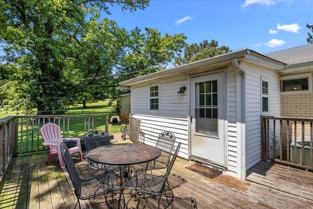 1109 N Charlotte St, Dickson, TN 37055 - wooden terrace with outdoor dining space