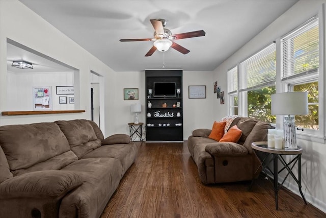 1109 N Charlotte St, Dickson, TN 37055 - living room featuring dark wood-style floors and a ceiling fan