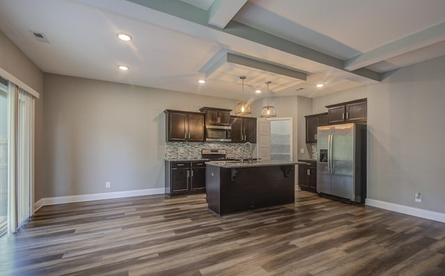 203 Eagles Talon Ct, Clarksville, TN 37040 - kitchen featuring stainless steel appliances, a kitchen bar, dark wood-style floors, tasteful backsplash, and dark brown cabinets