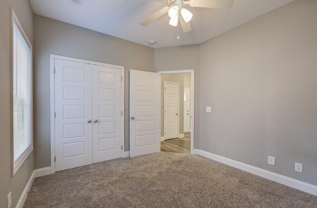 203 Eagles Talon Ct, Clarksville, TN 37040 - unfurnished bedroom with carpet floors, a closet, and a ceiling fan