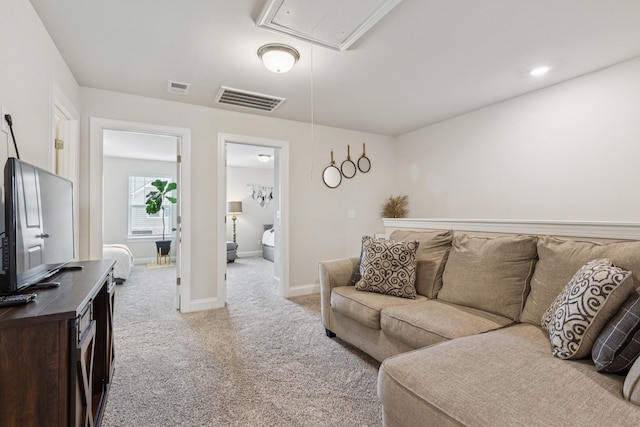 817 Arrington Way, Columbia, TN 38401 - living room featuring attic access and light carpet