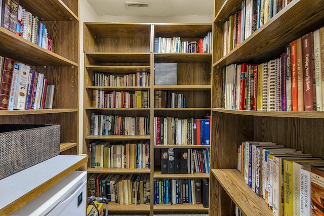 6434 Waconda Point Rd, Harrison, TN 37341 - living area with wall of books