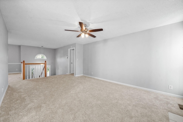 876 Gordon Pl, Clarksville, TN 37042 - unfurnished living room with ceiling fan, carpet, and a textured ceiling