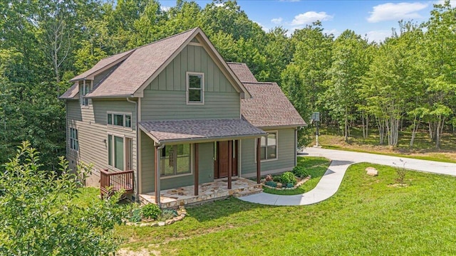 220 Bear Crawl Rd Unit Rb 28, Jasper, TN 37347 - view of front of home featuring board and batten siding, a porch, a front yard, and roof with shingles