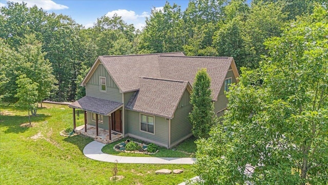 220 Bear Crawl Rd Unit Rb 28, Jasper, TN 37347 - view of front of home featuring a porch, roof with shingles, a front yard, and board and batten siding