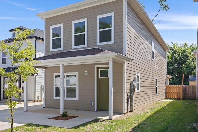 2140 18th Ave N, Nashville, TN 37208 - view of front facade featuring a patio area and roof with shingles