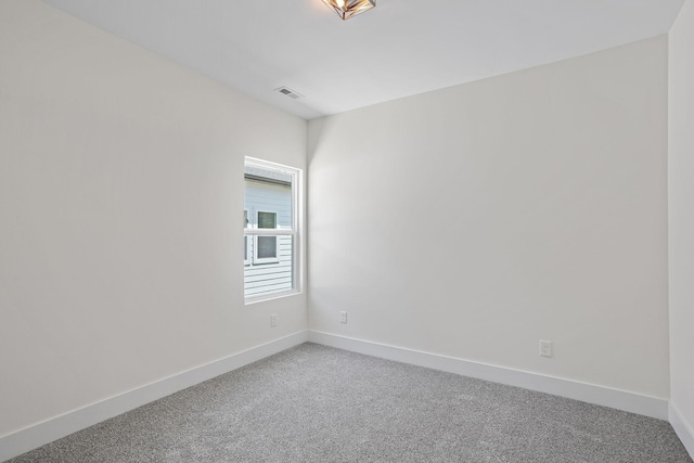 2140 18th Ave N, Nashville, TN 37208 - carpeted spare room featuring baseboards