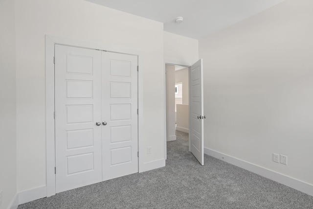 2140 18th Ave N, Nashville, TN 37208 - unfurnished bedroom with carpet floors and a closet