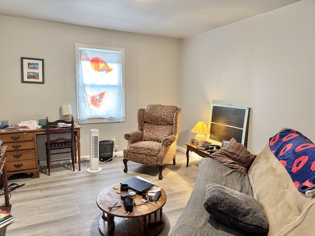 1812 13th St E, Chattanooga, TN 37404 - living area featuring wood finished floors and a desk