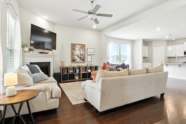 3154 Rift Ln, Murfreesboro, TN 37130 - living area featuring a fireplace, dark wood-type flooring, a ceiling fan, and recessed lighting