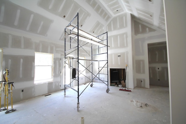 307 Brinkley Rd, Wartrace, TN 37183 - unfurnished living room featuring vaulted ceiling