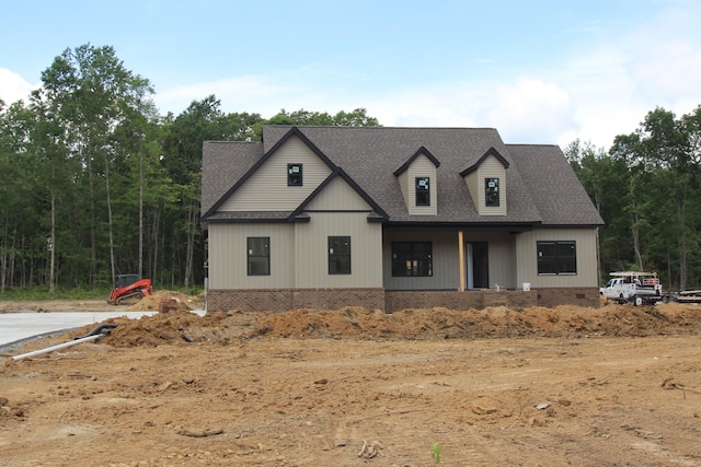 307 Brinkley Rd, Wartrace, TN 37183 - modern farmhouse style home featuring roof with shingles and brick siding