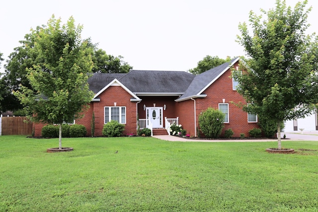 203 Ha Le Koa Ct, Smyrna, TN 37167 - view of front facade featuring brick siding and roof with shingles