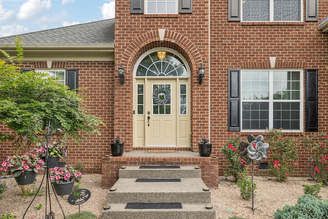 1011 Brixworth Dr, Thompsons Station, TN 37179 - property entrance featuring brick siding and roof with shingles