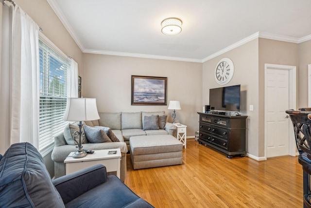 1011 Brixworth Dr, Thompsons Station, TN 37179 - living room featuring crown molding and light wood-style floors