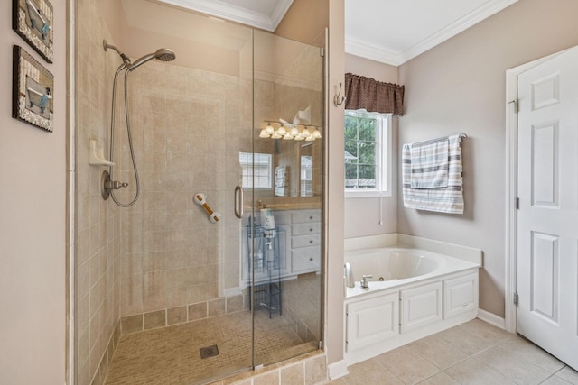 1011 Brixworth Dr, Thompsons Station, TN 37179 - bathroom featuring a shower stall, a garden tub, crown molding, and tile patterned flooring