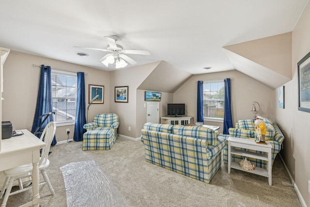 1011 Brixworth Dr, Thompsons Station, TN 37179 - carpeted living room featuring plenty of natural light, an office area, a ceiling fan, and vaulted ceiling