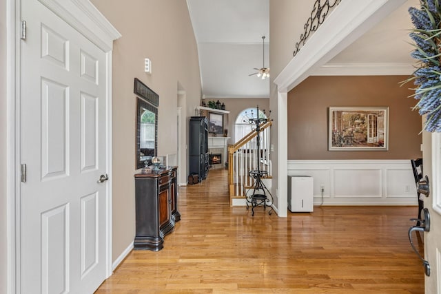 1011 Brixworth Dr, Thompsons Station, TN 37179 - foyer entrance with high vaulted ceiling, ceiling fan, and light wood-style floors