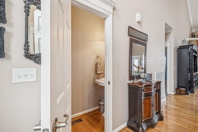 1011 Brixworth Dr, Thompsons Station, TN 37179 - hall with wood finished floors and baseboards