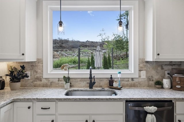 718 Excalibur Ct, Smyrna, TN 37167 - kitchen featuring dishwasher, white cabinets, decorative backsplash, and decorative light fixtures