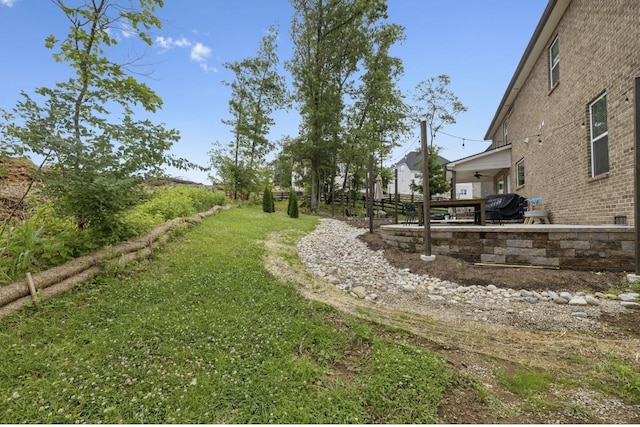 718 Excalibur Ct, Smyrna, TN 37167 - view of green lawn featuring ceiling fan and a patio